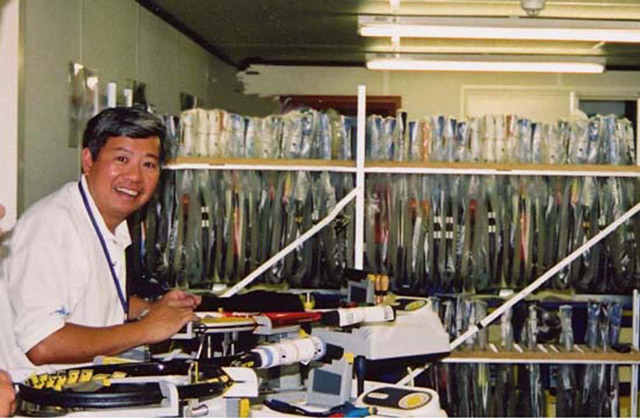 Sam in the Wimbledon stringing room