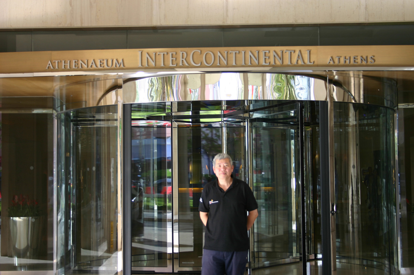 Sam in front of the hotel